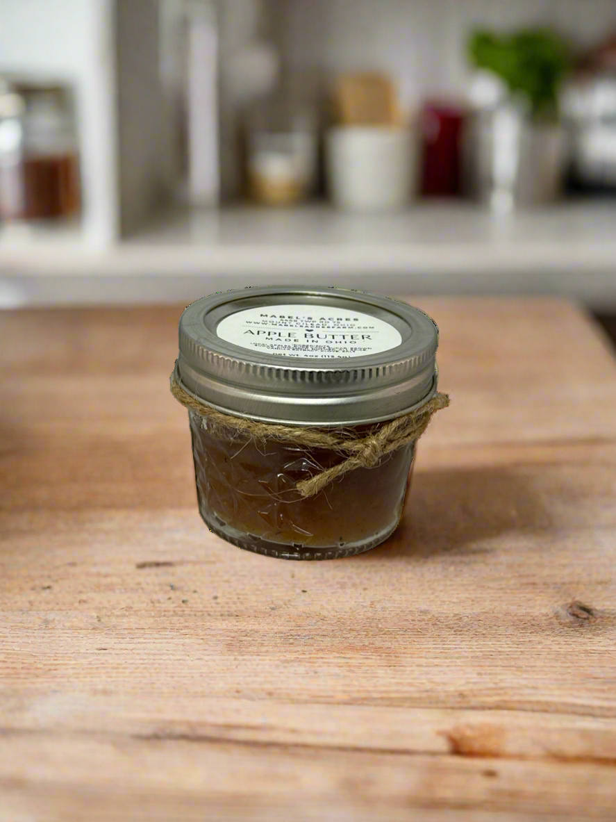 Jar of homemade Ohio apple butter from Mabel’s Acres, made with local apples and spices in small batches.